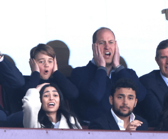 Prince George and Prince William enjoying the match at Villa Park