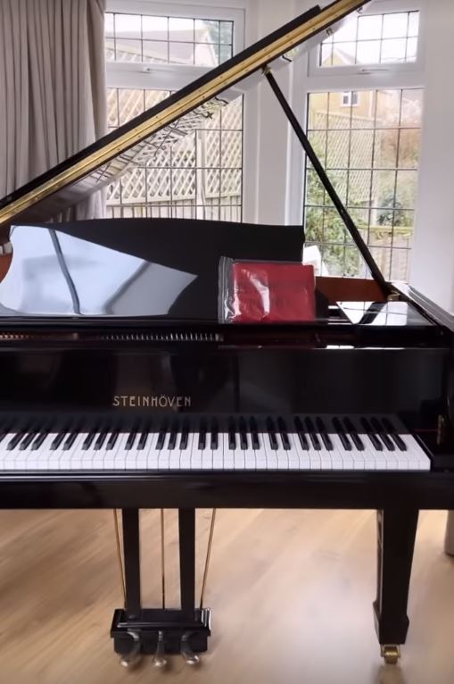 The IBF champ’s house features a huge piano