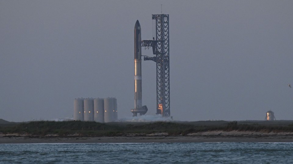 The 33-engine, nearly 400-feet tall rocket as it stood prior to the first launch attempt on Monday