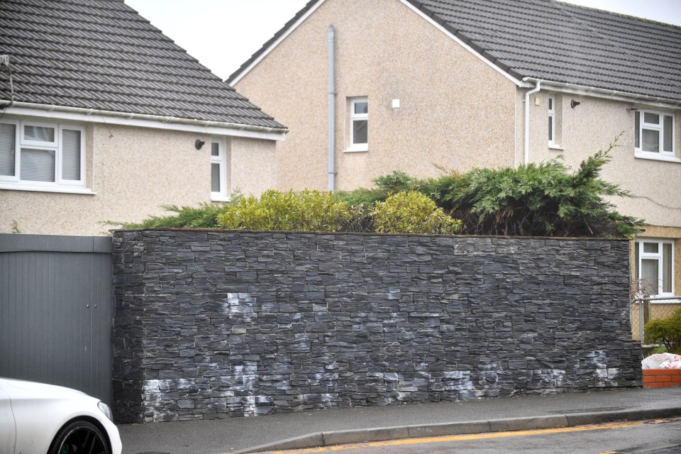 The six foot wall is nearly identical to another one on Mark's road