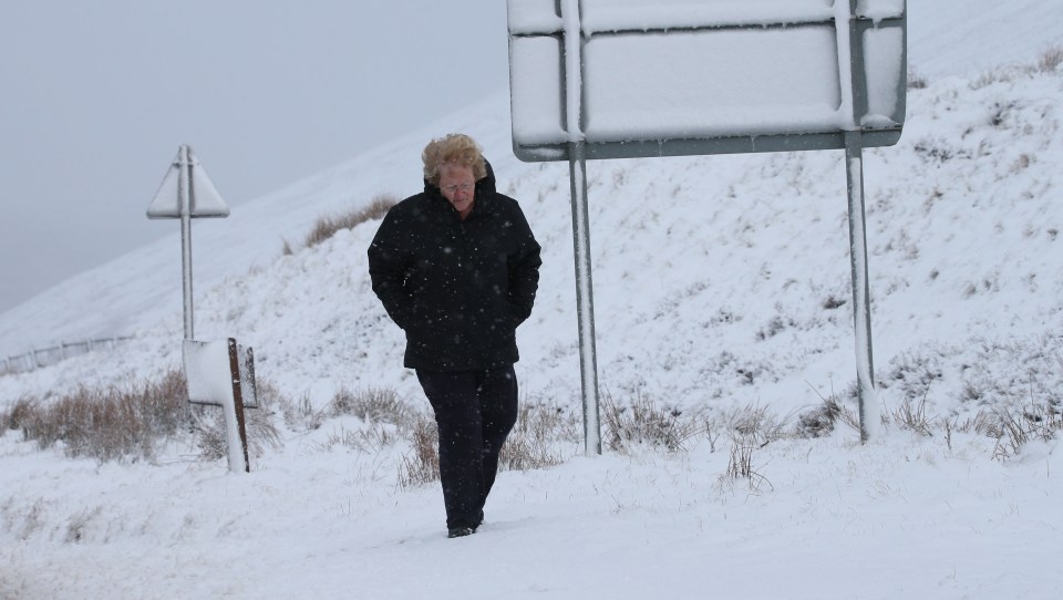 Pat Mathieson from Tomintoul, in the Cairngorms National Park, makes his way through the snow today