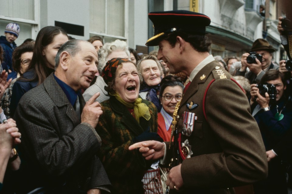 Charles in his military uniform with crowds in Canterbury in 1978