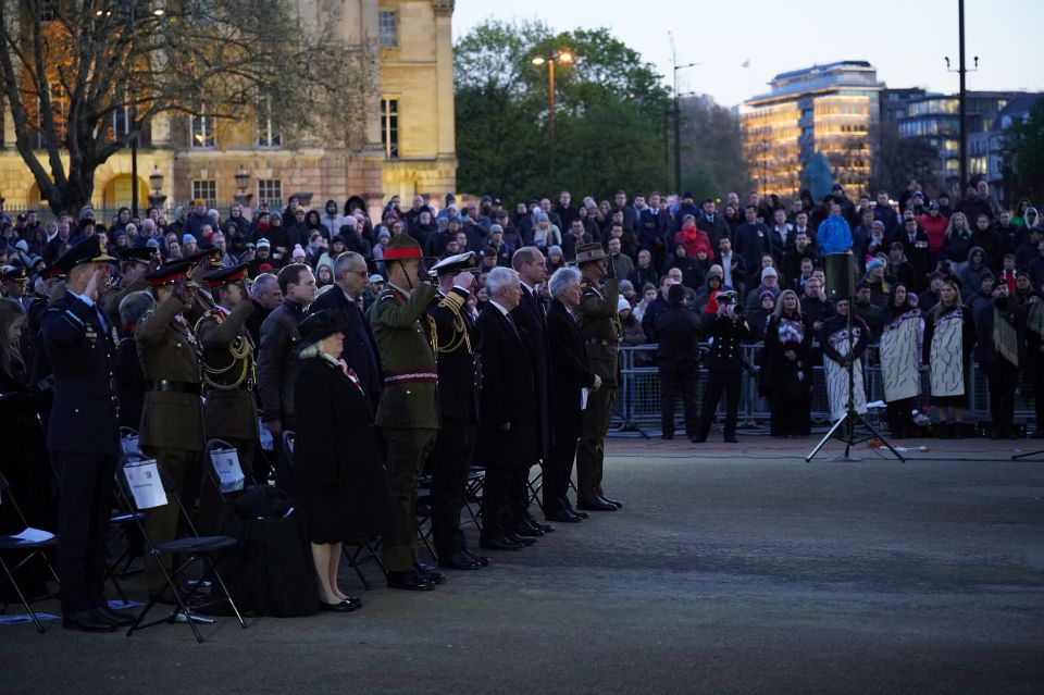 Hundreds of people observed Anzac Day in central London at sunrise