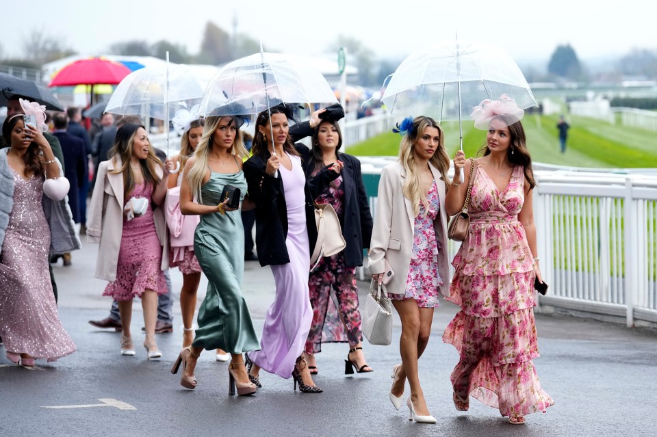 Towering heels, beautiful dresses and see-through umbrellas have been all the rage today