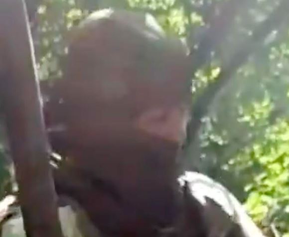 One of the Russian soldiers on camera, during the alleged decapitation of a Ukrainian troop