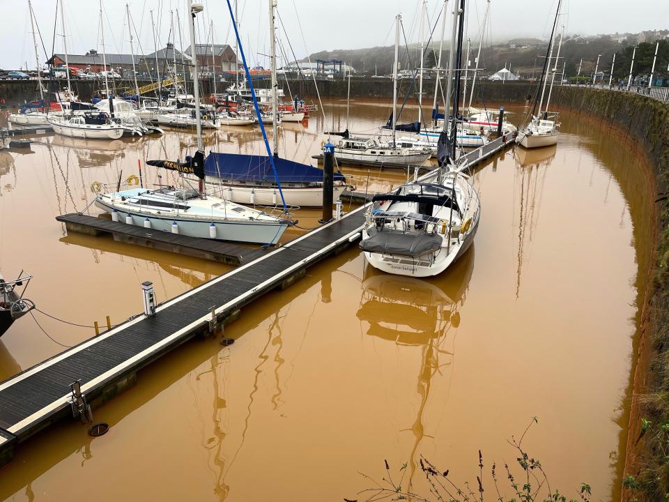 Whitehaven Harbour residents are scratching their heads after the seaside town's water turned orange