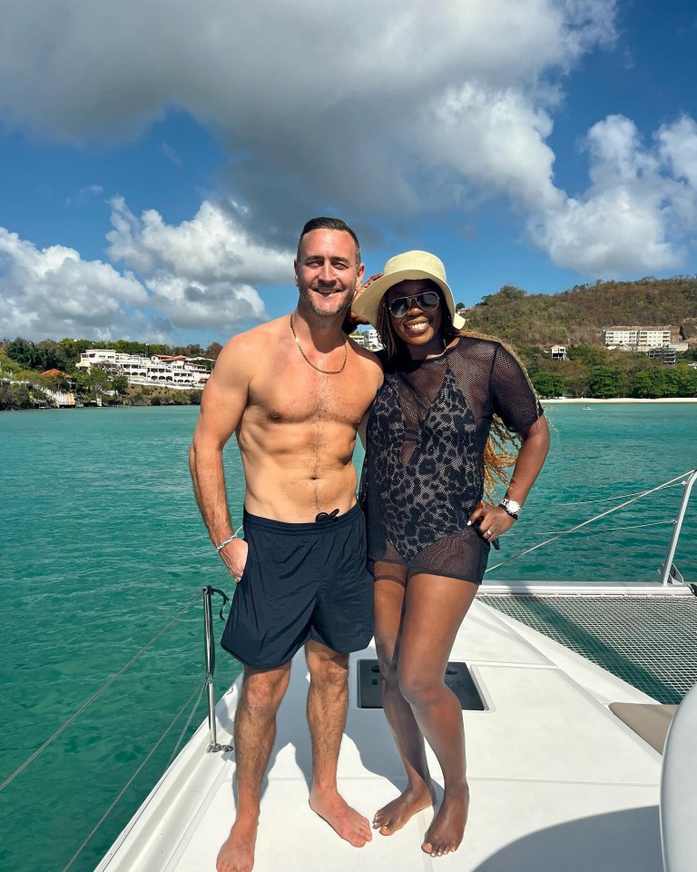 Will posed with his wife Michelle on a boat