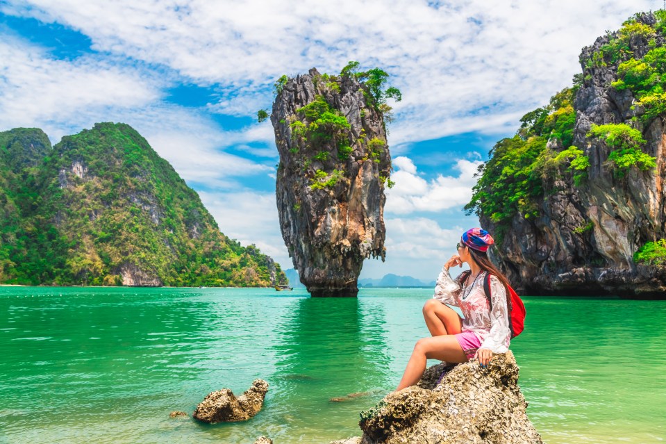 Adventure traveler woman joy look amazed nature scenic landscape James Bond Island, Famous landmark Travel Phuket Thailand, Tourist on summer holiday vacation, Tourism beautiful destination place Asia; Shutterstock ID 1254849973; purchase_order: -; job: -; client: -; other: -