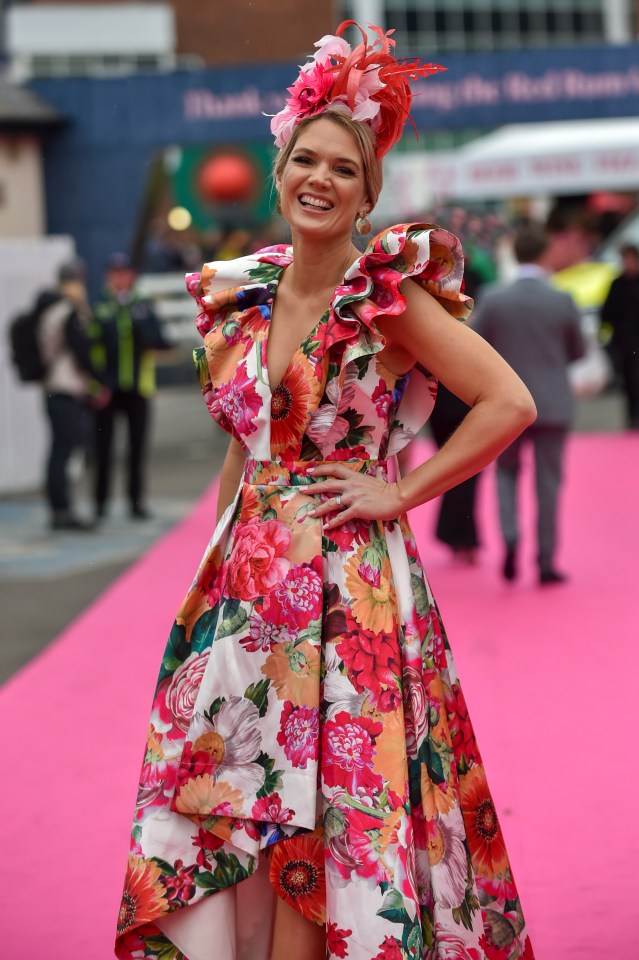 TV host Charlotte Hawkins put her best fashion foot fowards in a eye-catching floral gown with frilled sleeves