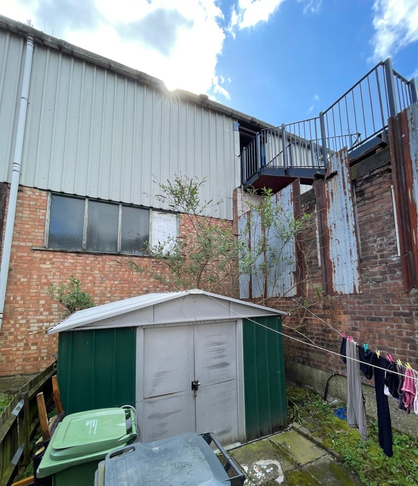 Anu's garden is directly next to the stairs leading the seats for away fans