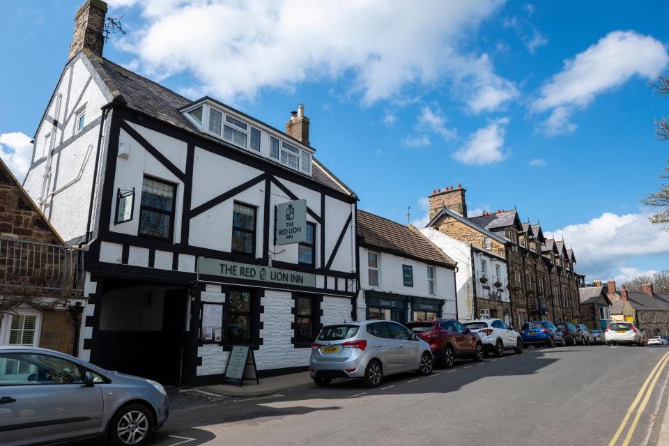 The Red Lion offers drinks, dinner and views of the Aln estuary from its beer garden