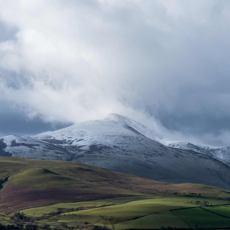 Skiddaw mountain in the Lake District covered in snow this morning