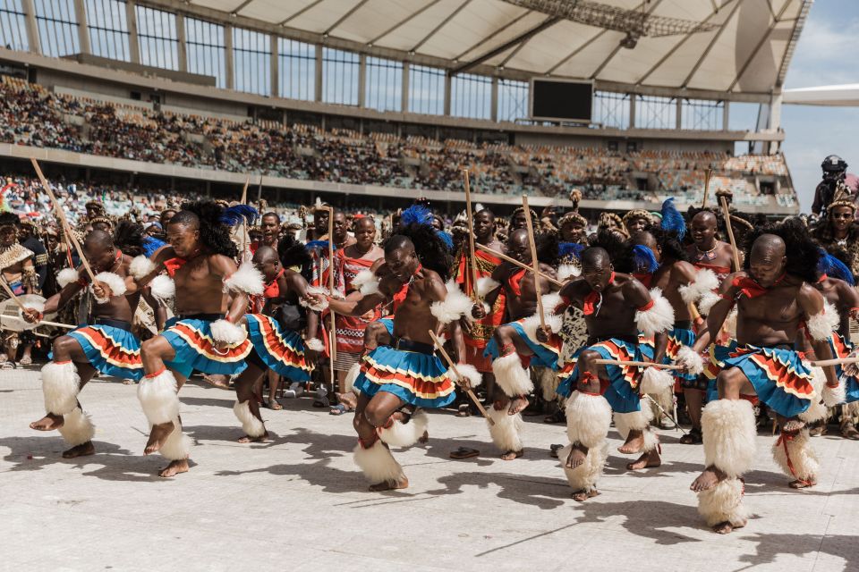 Men from Swaziland perform a dance at the Moses Mabhida Stadium in Durban