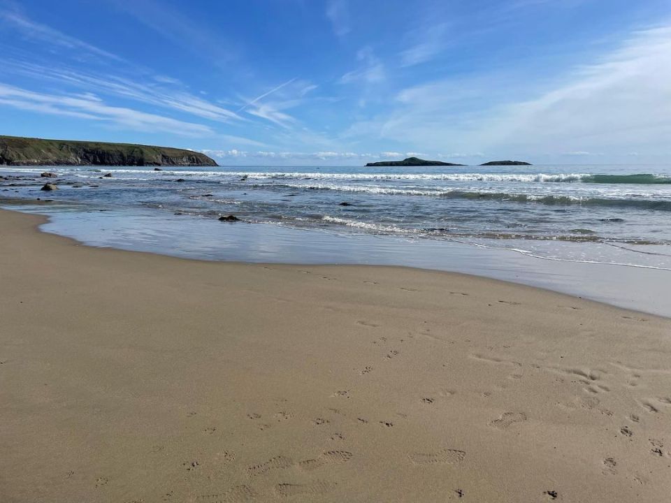 The beach is a mile long sandy bay at the end of the Llyn Peninsula