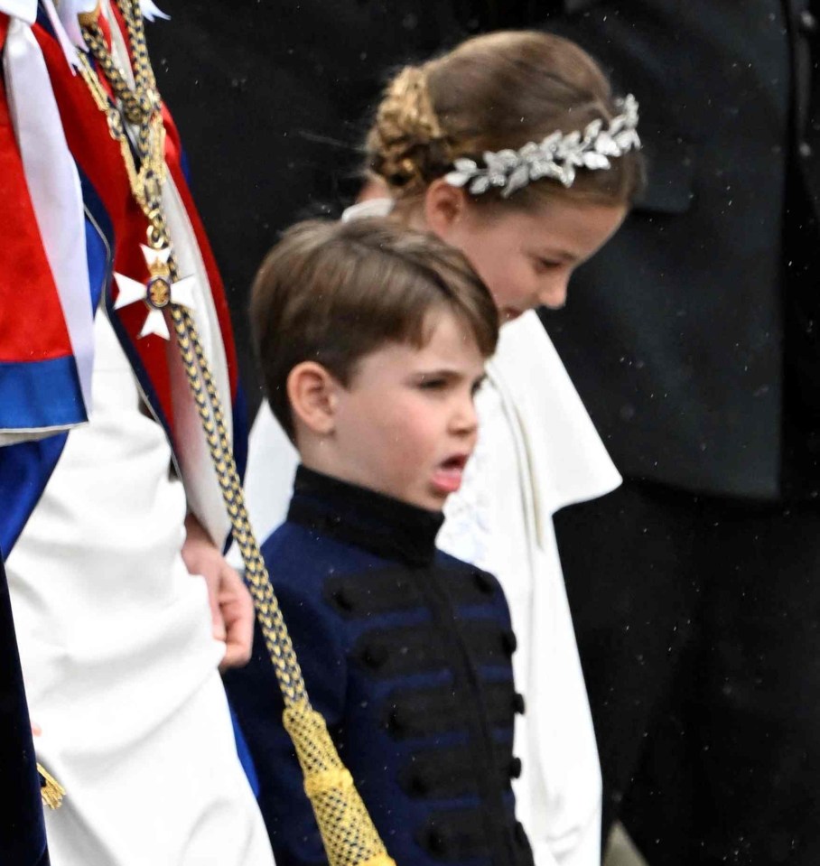 Prince Louis pulls a face while arriving at Westminster Abbey