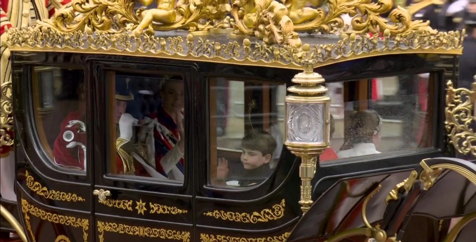 Prince Louis wave at crowds on the way to Buckingham Palace