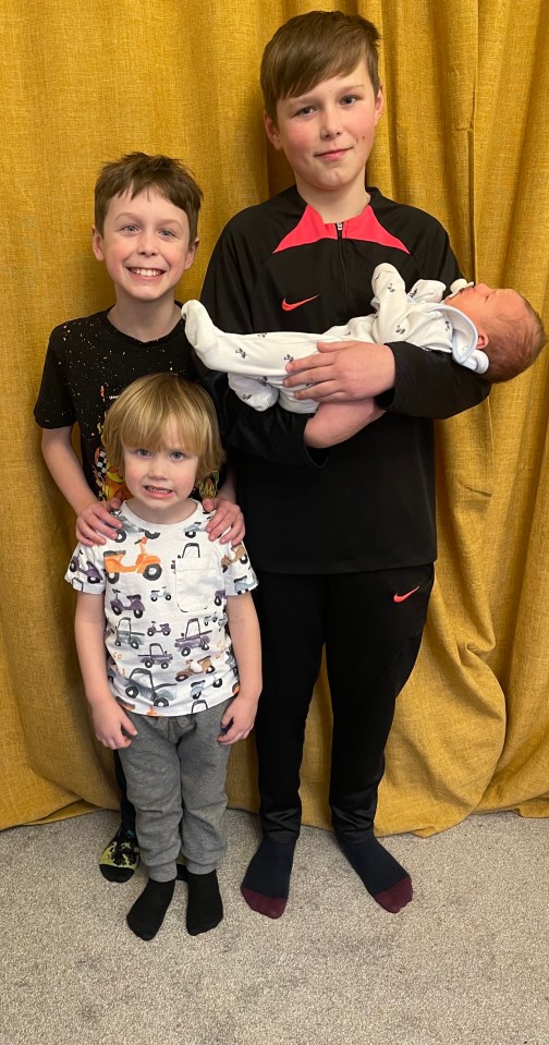 Rhys with his brothers Kayden, 11, Theo, 9, and four-month-old Arthur