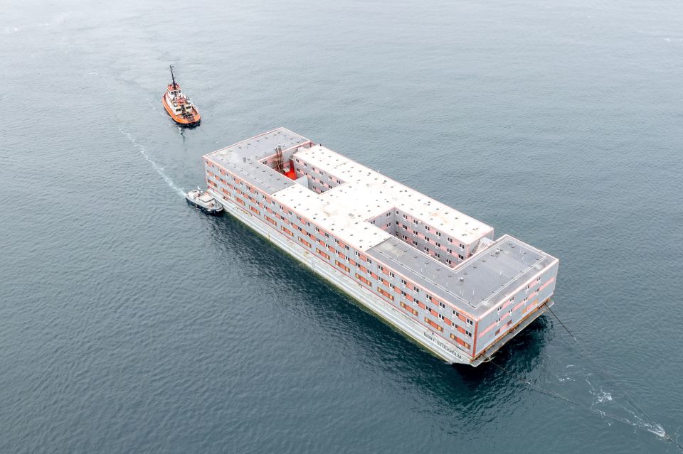 The 222-bedroom, three-storey vessel, will house around 500 migrants when it is in position in Portland Port