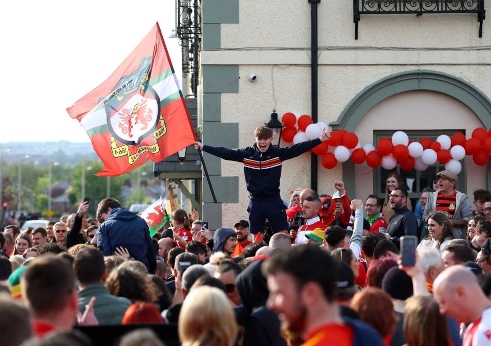 Thousands of fans turned out for the open-top bus tour