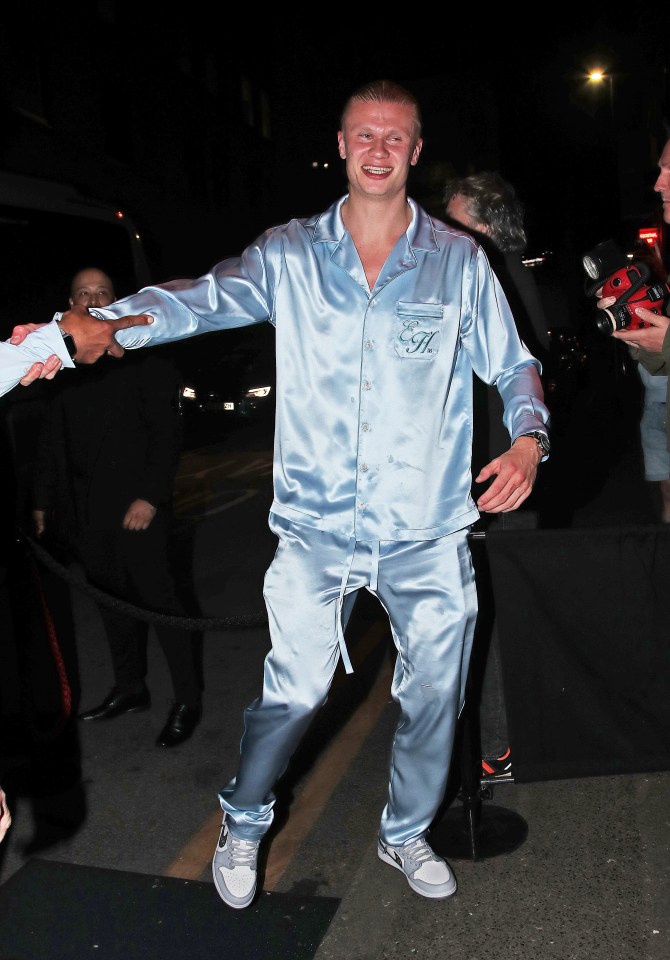 Erling Haaland dressed in customised silky sky blue pyjamas