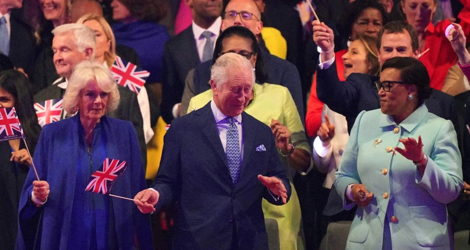 King Charles and Queen Camilla were seen dancing and waving Union flags at the coronation concert