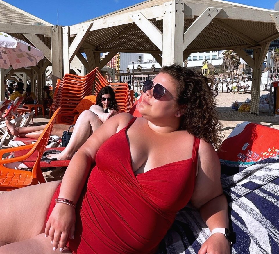 The ex-Gogglebox star looked slimmer than ever in a red swimsuit on holiday