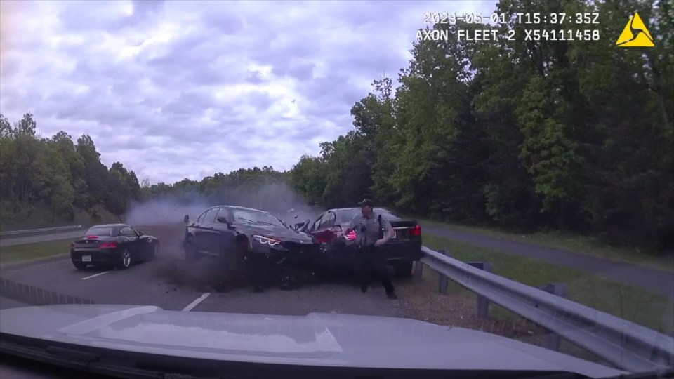 The cop's dashcam shows how the BMW span and careered across to the opposite carriageway towards the other car.