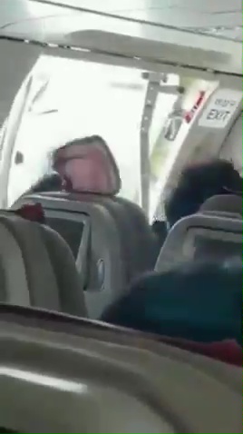 The terrifying moment a plane door was forced open in midair over South Korea