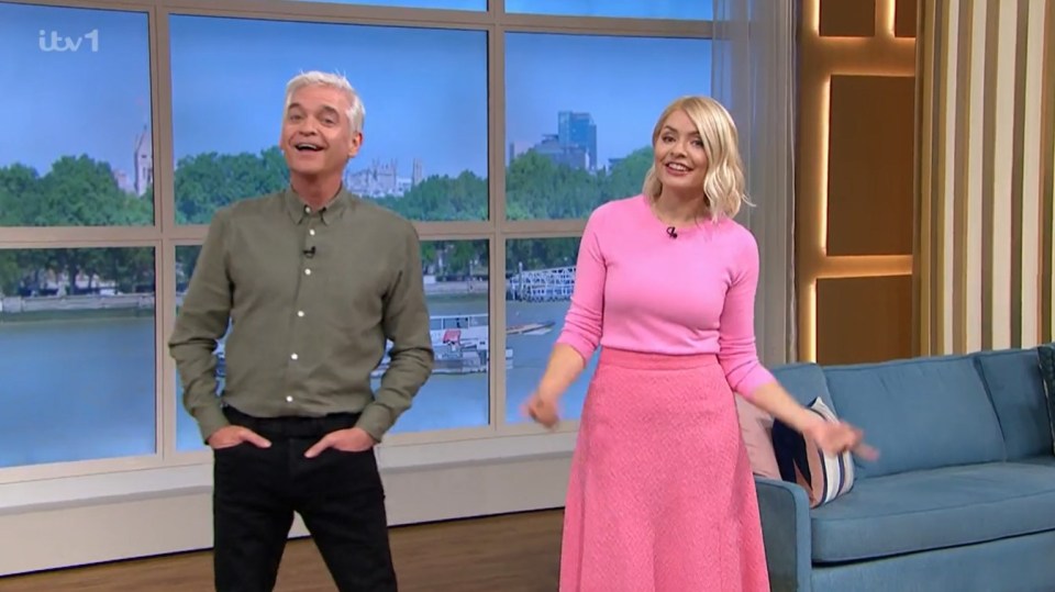 Judi claims Phil was in 'jaunty overkill mode', looking ' super-perky and rather self-amused'