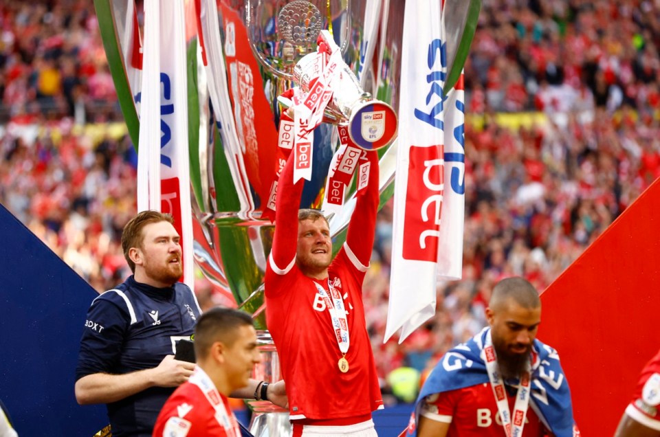 Soccer Football - Championship Play-Off Final - Huddersfield Town v Nottingham Forest - Wembley Stadium, London, Britain - May 29, 2022 Nottingham Forest's Joe Worrall celebrates with the trophy after winning the Championship Play-Off Final Action Images via Reuters/Andrew Boyers