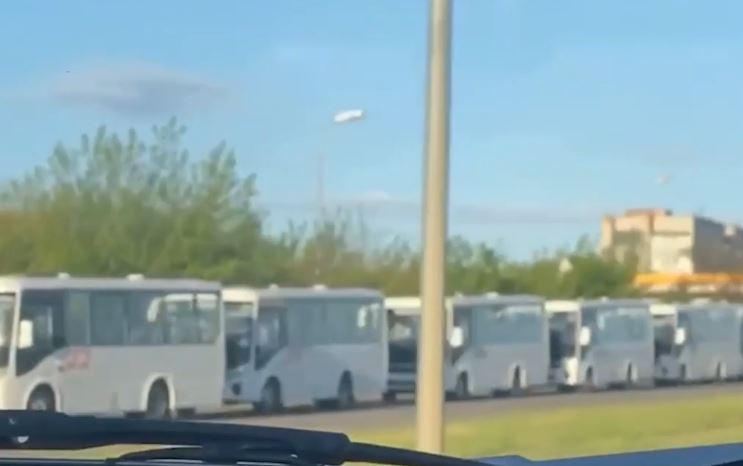 Buses are seen parked up as thousands are ordered to evacuate