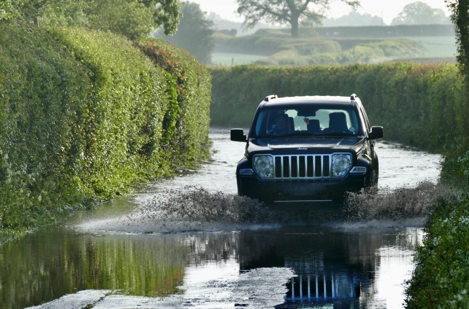 Drivers struggled along flooded country lanes in Oxfordshire this morning