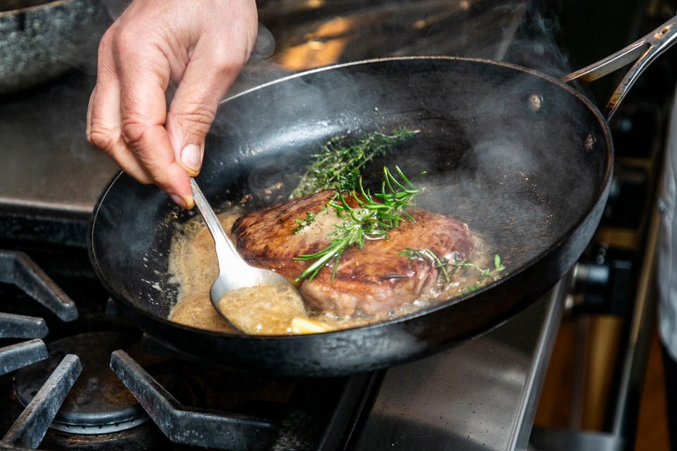 Aldo says get rid of as much oil as possible on the steak before you put it on the grill