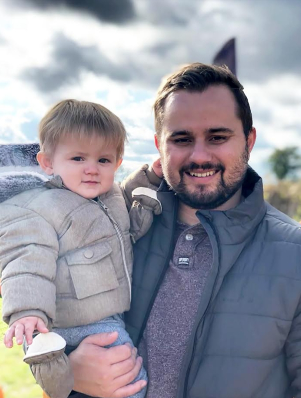 Ben Cirne, 30, who experienced extreme fatigue, with his son Hugo