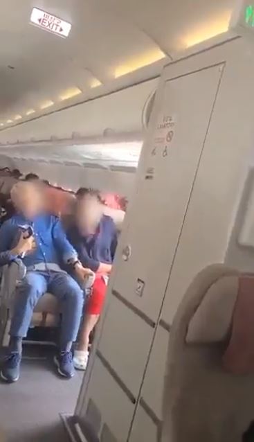 Passengers gripped their seats tightly as winds swept through the cabin