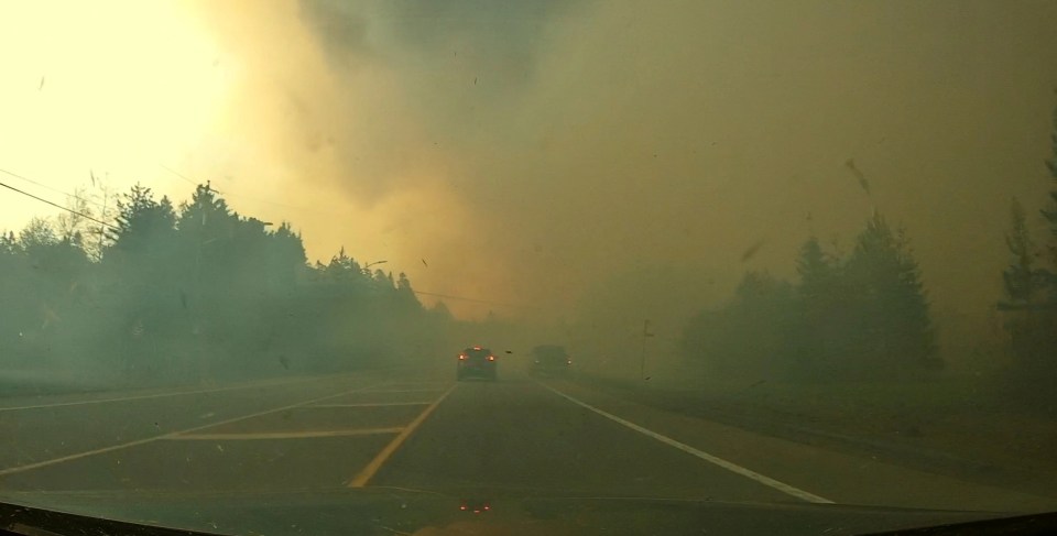 Both cars made it out safely but the thick cloud of smoke lingered in the sky