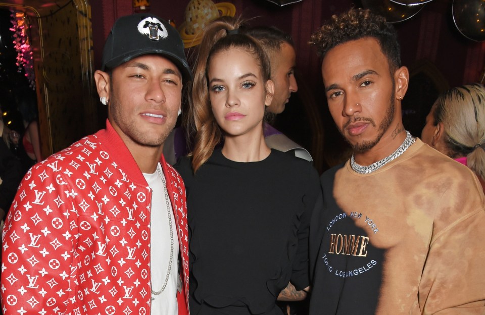 Neymar, Barbara Palvin, and Lewis Hamilton at a party.