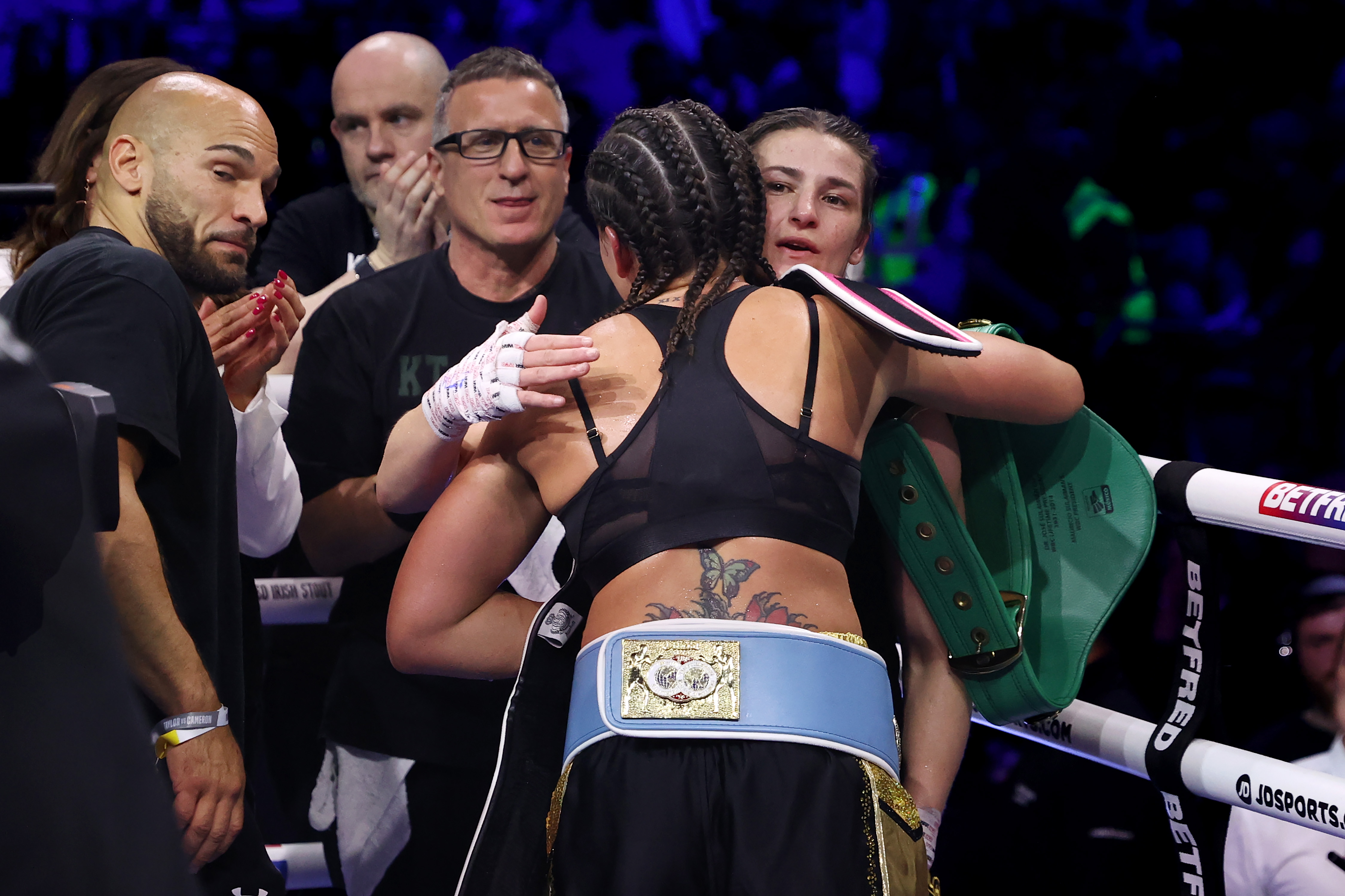 Both fighters embrace after the fight