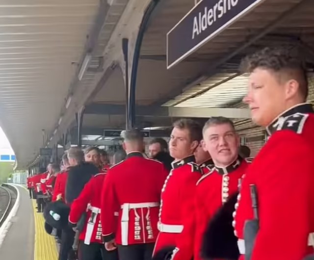 Coldstream guards at Aldershot station, near the Hampshire town's garrison, ahead of the rehearsal