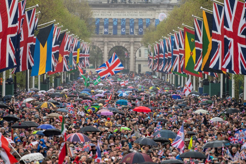 Thousands were battered with rain as they tried to catch a glimpse of the royals on their big day