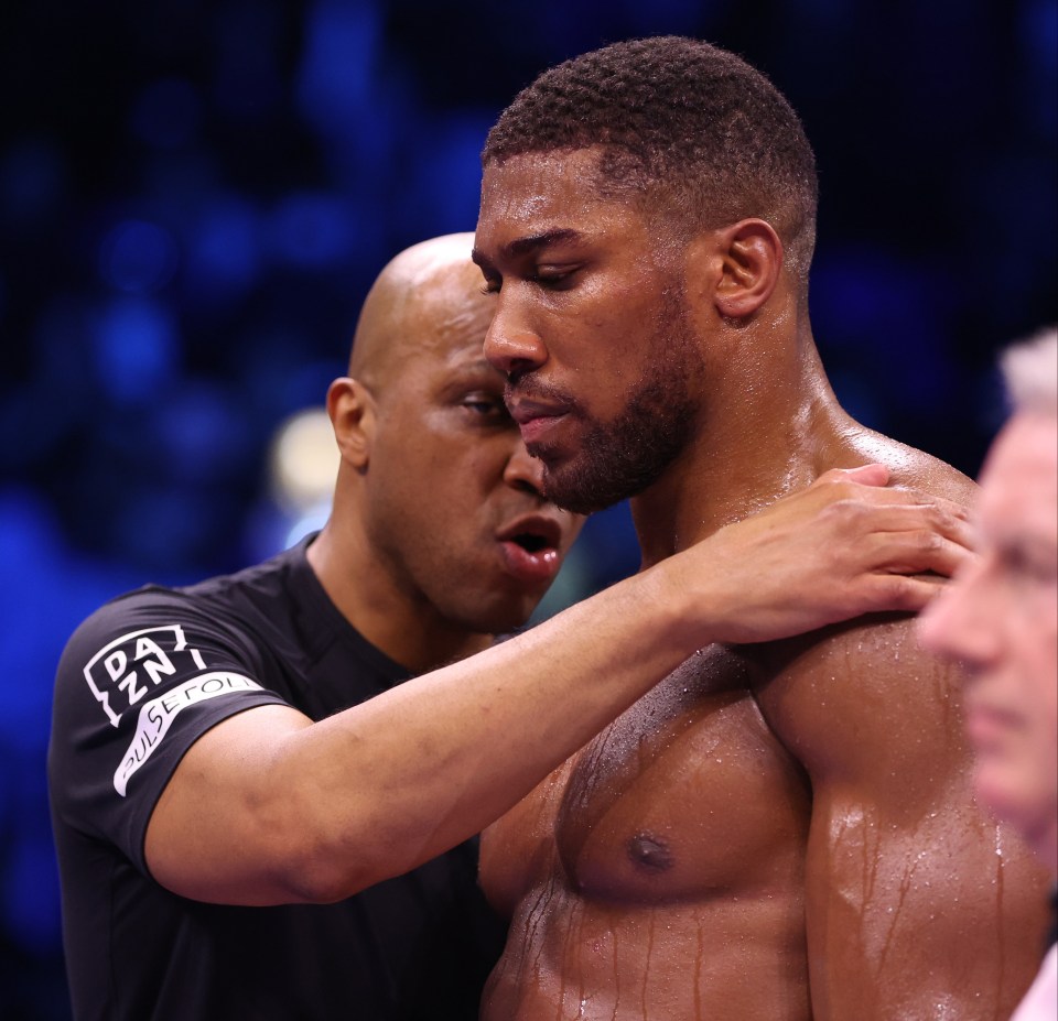 Trainer Derrick James with Anthony Joshua