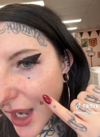 She shared that she loves her face tattoos, explaining they're some of her favorite of the hundreds that cover her entire body