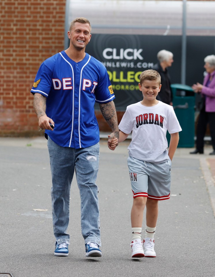 The father-son duo were all smiles on their stroll