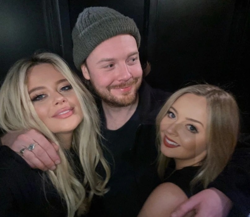 Emily with her sister Martha and rarely-seen brother George on a family night out last year