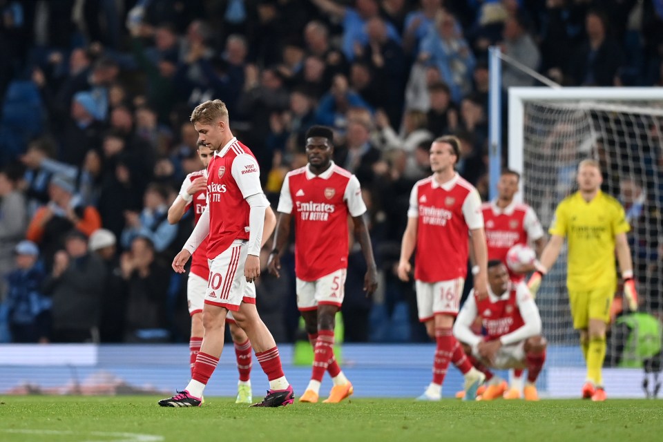 Arsenal are a point behind Manchester City after blowing an eight-point lead