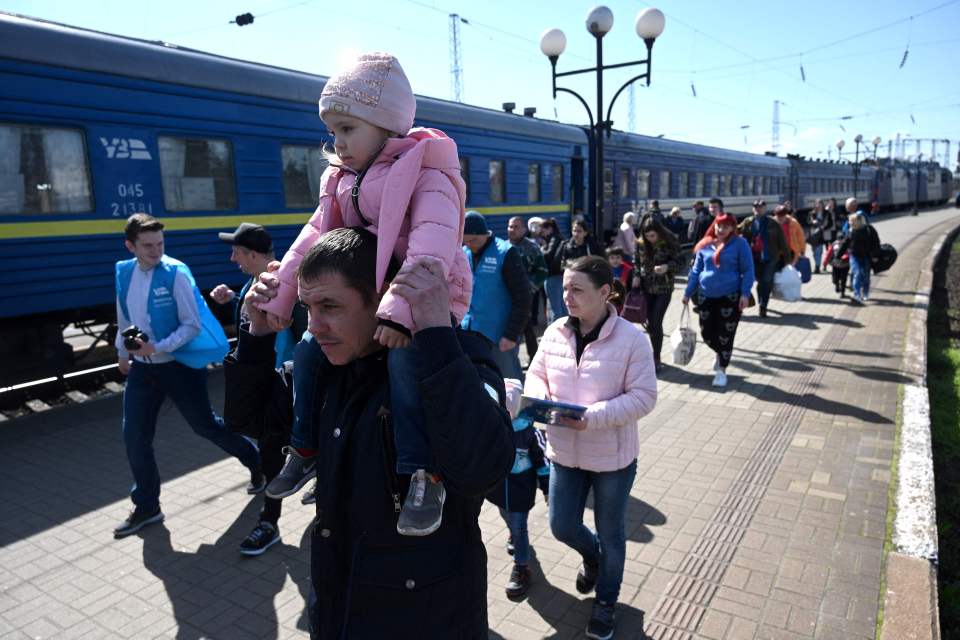 Evacuees from Zaporizhzhia region arriving in the Ukrainian city of Lviv last month