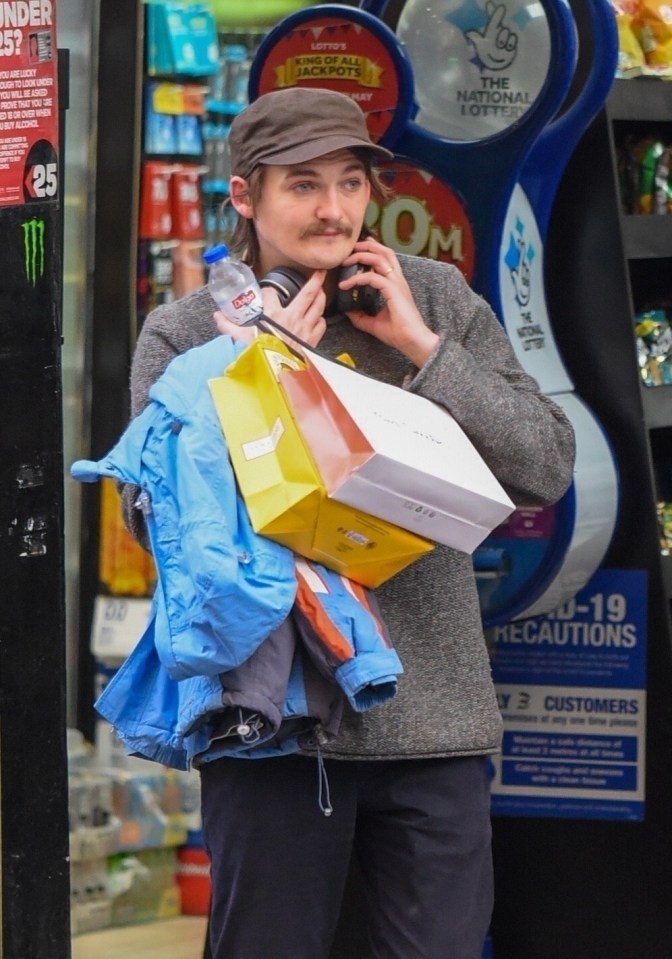 Gleeson donned a walrus style moustache while wearing a casual outfit