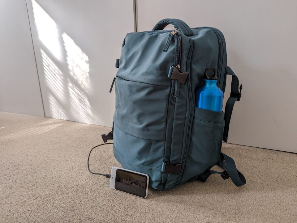 I also packed my water bottle and made use of bag’s external USB charger port