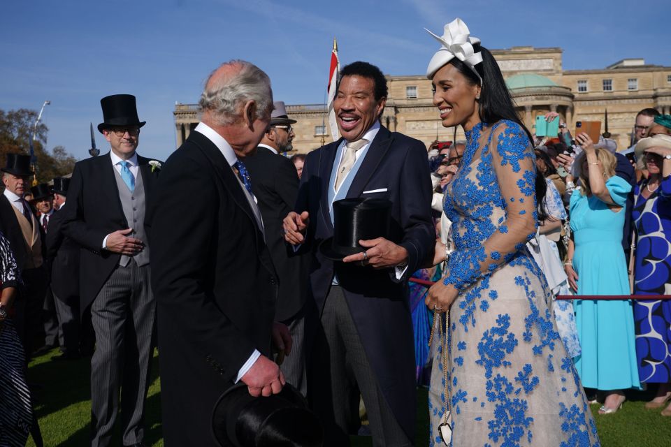 King Charles III with Lionel Richie and Lisa Parigi during a Garden Party at Buckingham Palace