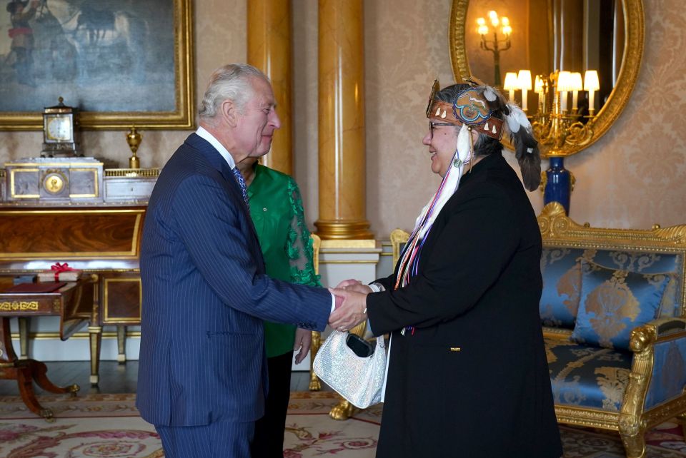 Charles, who is monarch of Canada, greets Canadian indigenous leader Chief RoseAnne Archibald